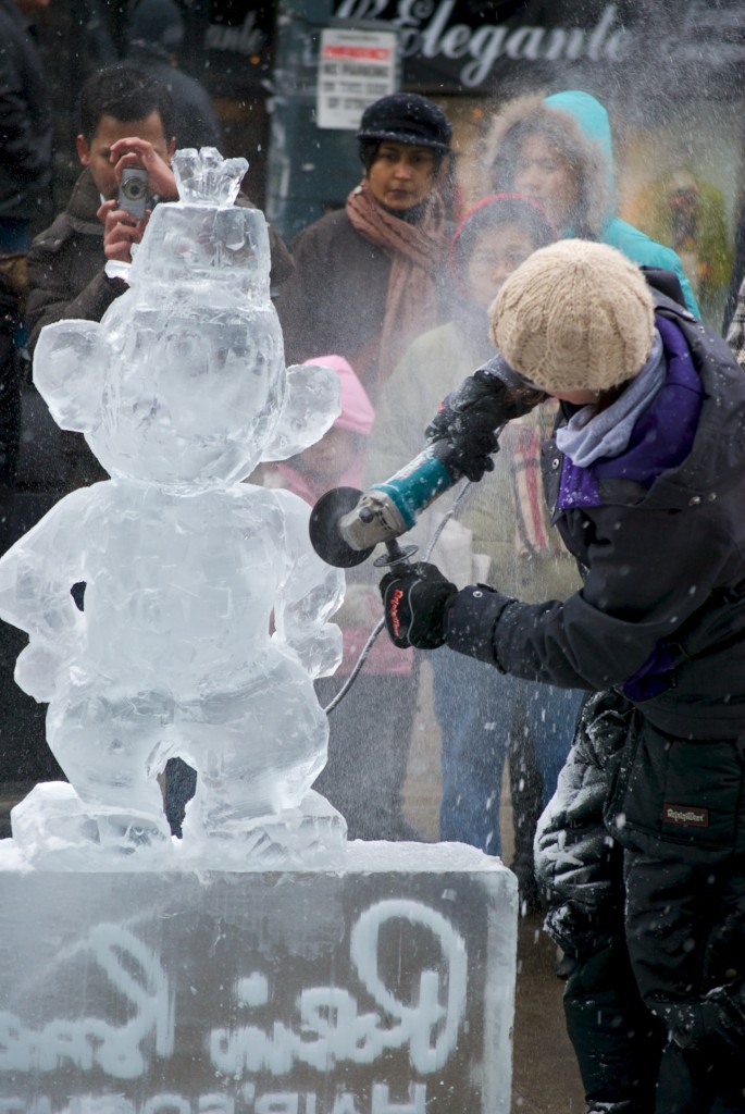 Ice sculptor in action on Cumberland Street, Toronto 2011-02-26