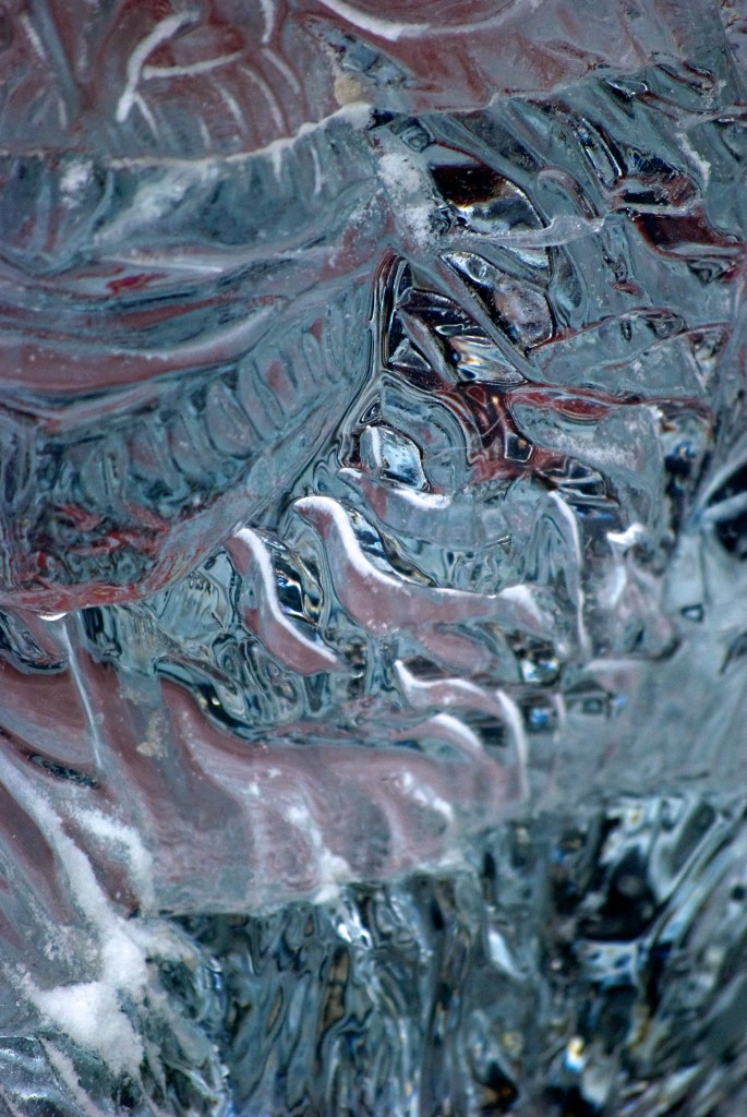 Pink tinged abstract view of ice sculpture on Cumberland Street, Toronto 2011-02-26