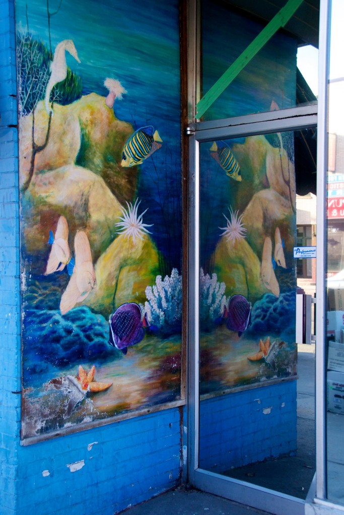 Mural at entrance of an unnamed Danforth Avenue storefront, Toronto 