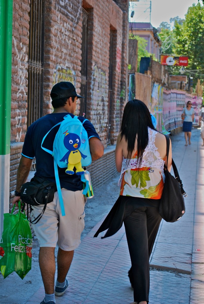 Couple walking in the Bellas Artes area of Santiago, Chile 2010-12-26