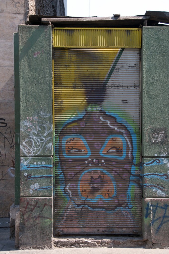 Mural on corrugated surface on Calle Santo Domingo in Santiago, Chile 2010-12-14