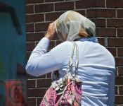 Walking by a brick wall, Toronto 2012-06-21