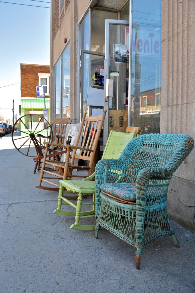 Chairs and spinning wheel for sale on rue Notre Dame in Lachine